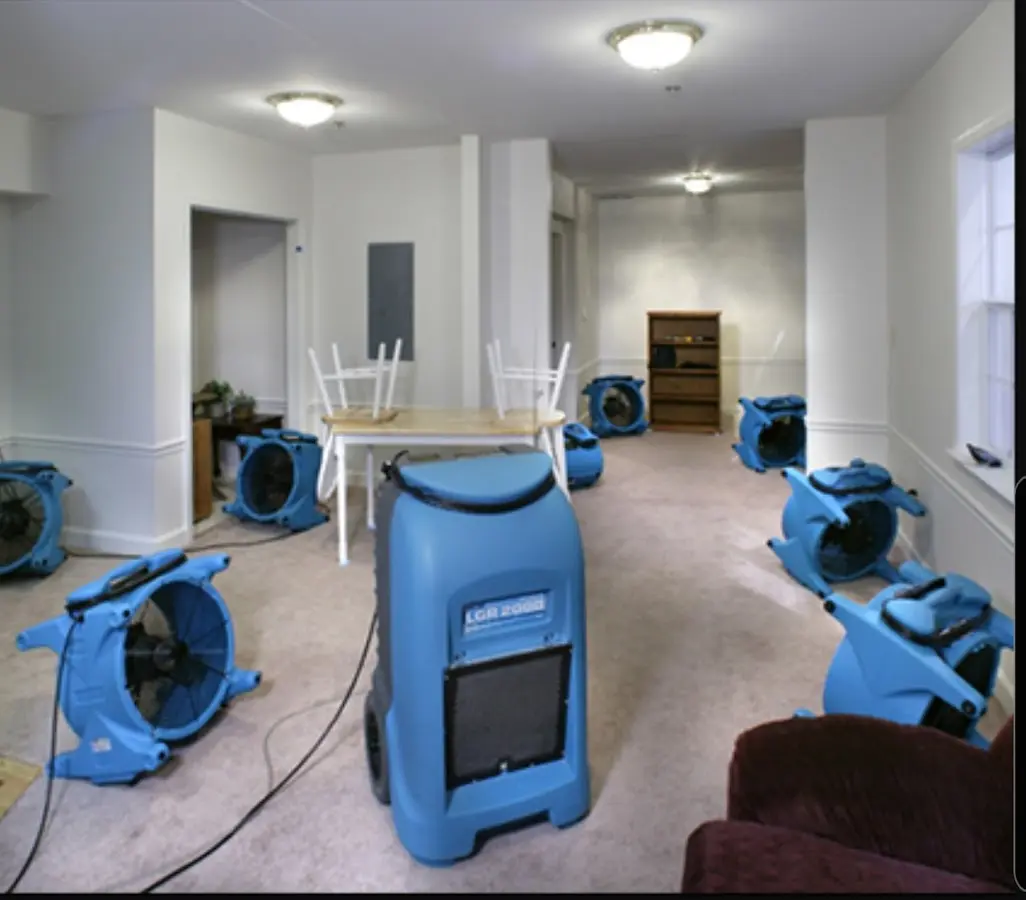 Air movers and dehumidifier setup for Water Extraction & Removal in Gray